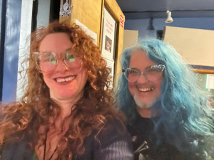 WTH Just Happened? two people smiling