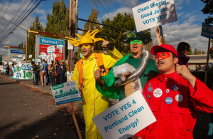 Portland Clean Energy Initiative sign waving @walmart Portland Clean Energy Initiative sign waving @walmart